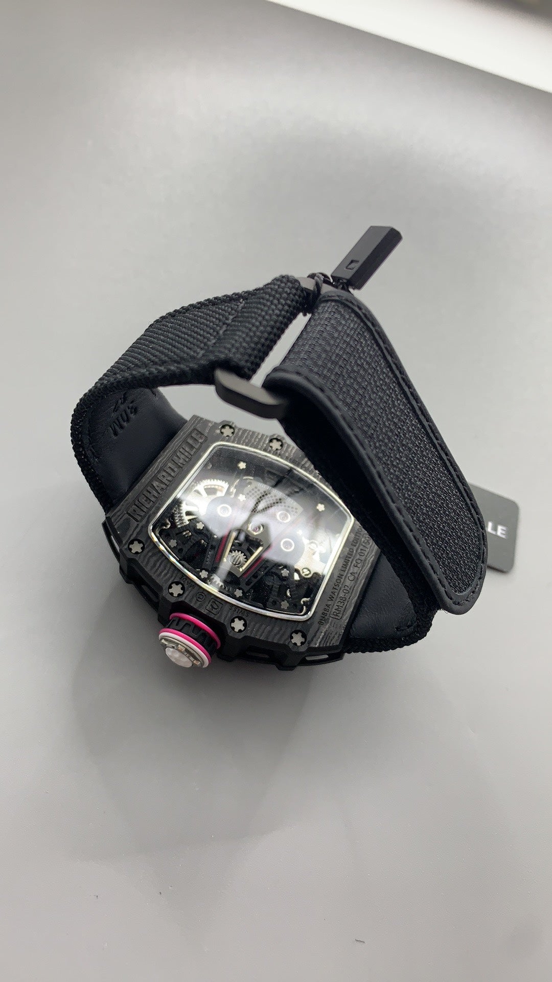 Richard Mille RM38-02 | 42MM | ตัวเรือนคาร์บอนไฟเบอร์ TPT + โครงไทเทเนียม | หน้าปัดสเกเลตัน | กลไกไขลานมือ Flying Tourbillon