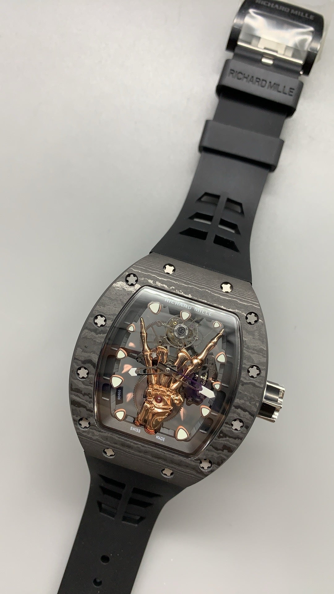 Richard Mille RM66 | 42MM | ตัวเรือนไทเทเนียมเกรด 5 + เคลือบ PVD สีโรสโกลด์ | หน้าปัดรูปมือโครงกระดูก (Skeleton Hand) | กลไกไขลานมือ Flying Tourbillon