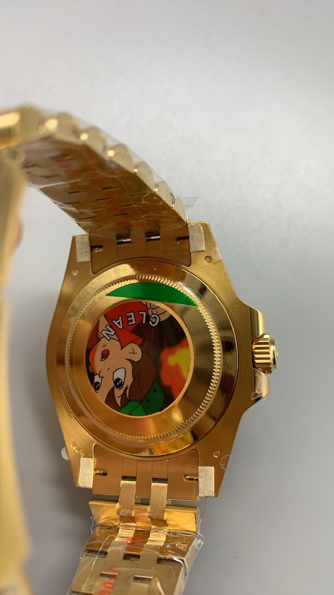 Rolex GMT-Master II 40MM | ขอบเซรามิกสีดำ-เทา (ขอบไข่เยี่ยวม้า) | ตัวเรือนสแตนเลสเคลือบสีทอง PVD | กลไกอัตโนมัติ Cal.3285