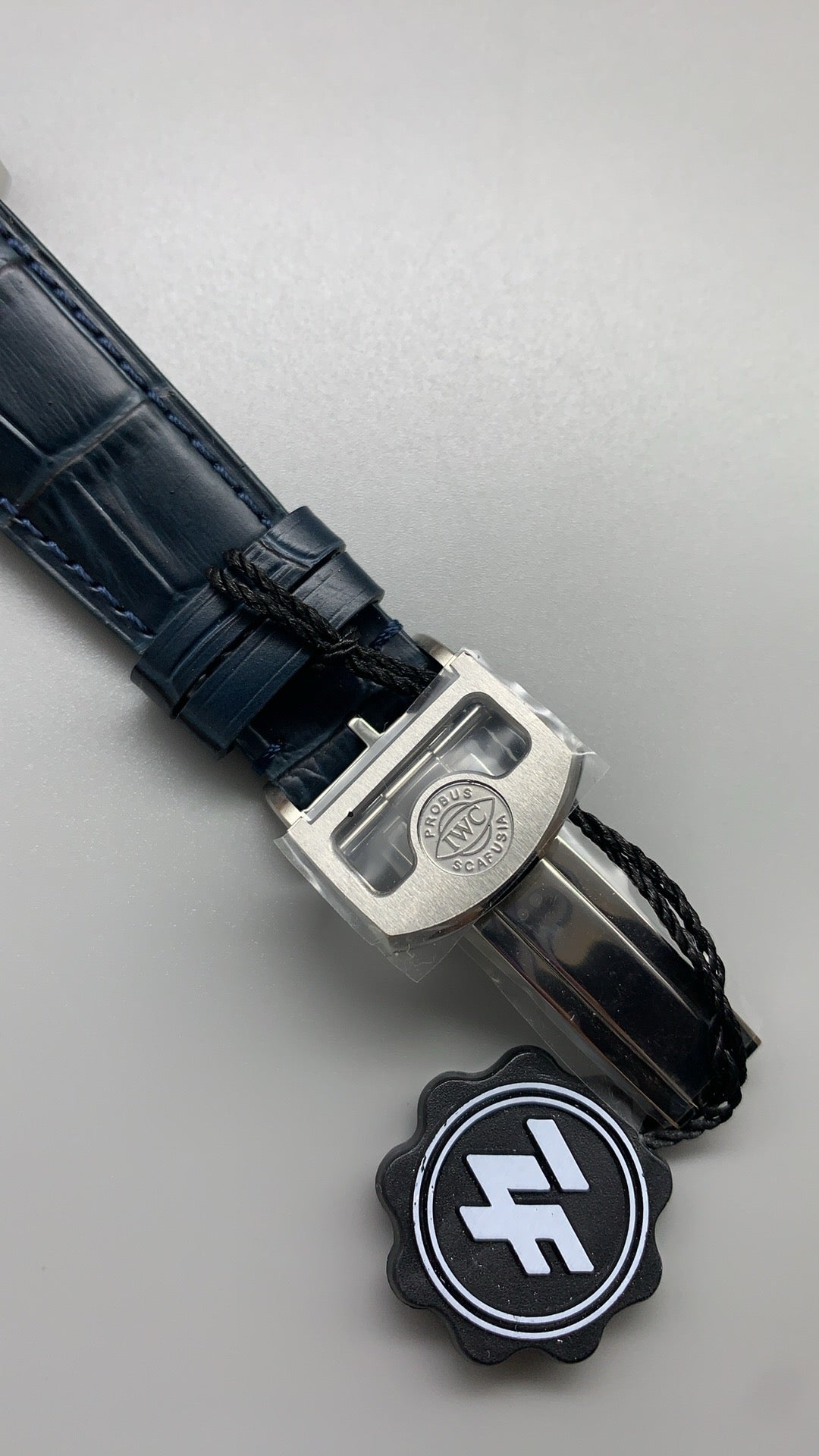 IWC Portugieser Automatic IW500705 | 42.3MM | ตัวเรือนสเตนเลสสตีล | หน้าปัดสีขาว | เข็มสีน้ำเงิน | สายหนังจระเข้สีน้ำเงิน | กลไกอัตโนมัติ Cal.52010