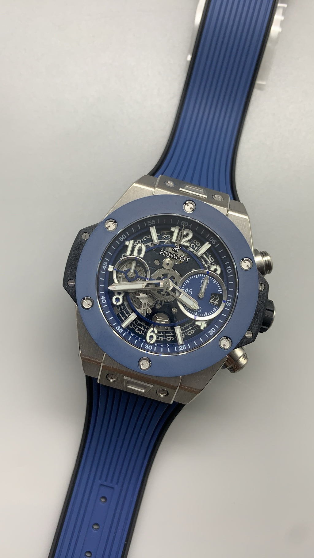 Hublot Big Bang Chronograph | 44MM | ตัวเรือนสแตนเลสสตีล | ขอบเซรามิกสีน้ำเงิน | หน้าปัดสเกเลตัน | จับเวลา Chronograph | กลไกอัตโนมัติ HUB4100