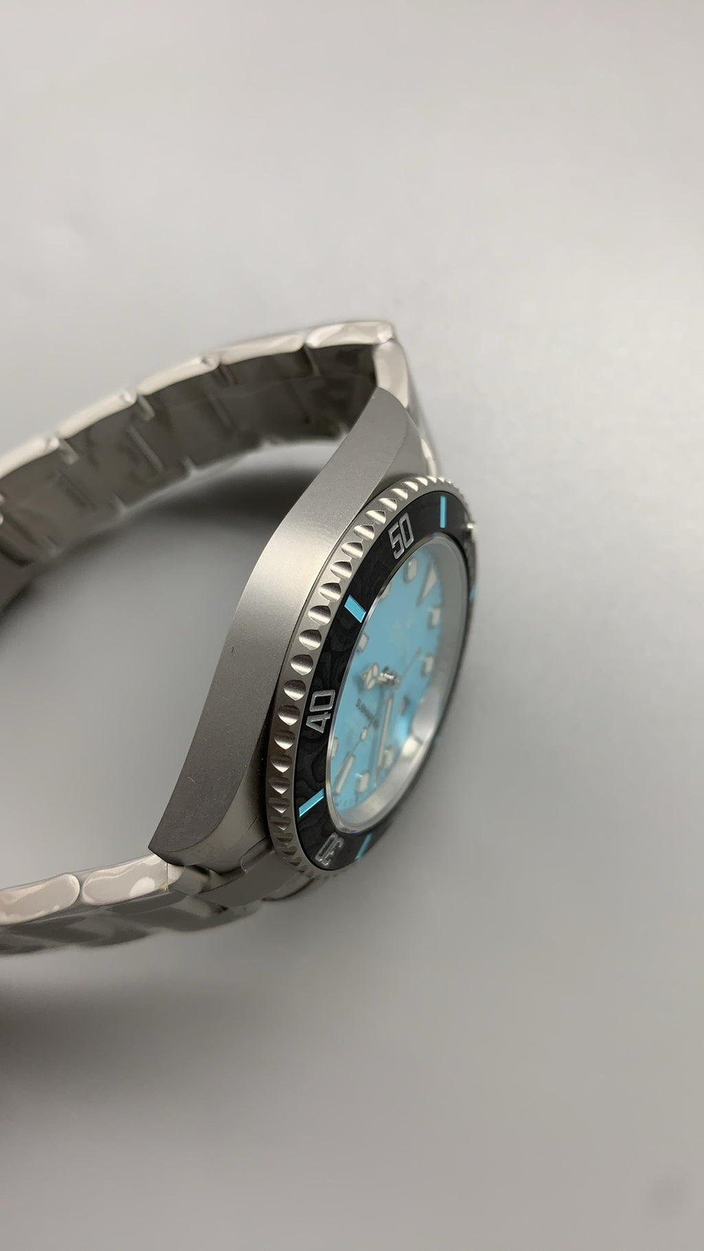 Rolex Submariner DIW 40MM | หน้าปัดสีฟ้า Tiffany | ตัวเรือนไทเทเนียม | กลไกอัตโนมัติ Cal.3135