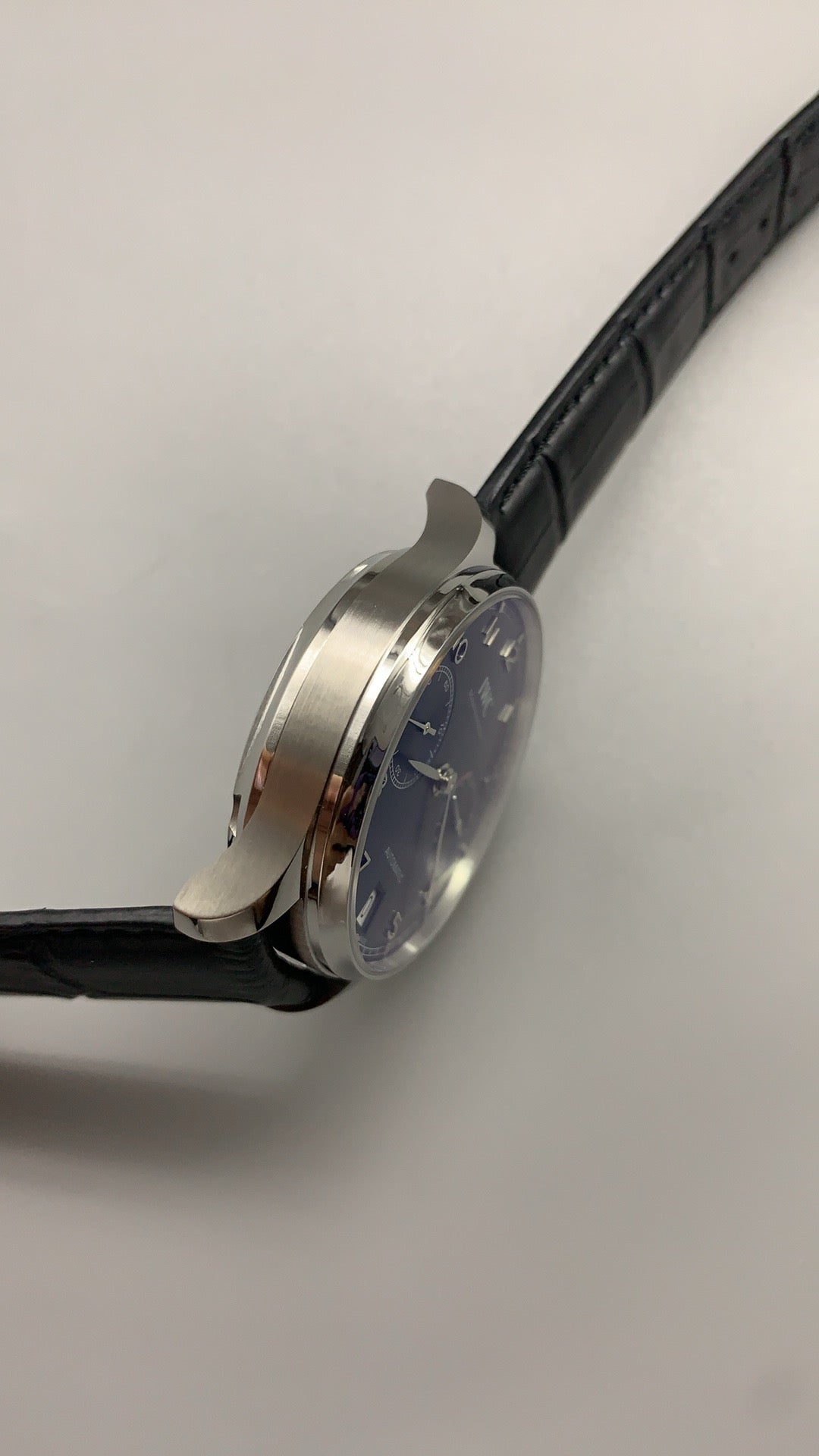 IWC Portugieser Automatic 7 Days | 42.3MM | ตัวเรือนสแตนเลสสตีล | พลังงานสำรอง 7 วัน | หน้าปัดสีน้ำเงิน | สายหนังจระเข้สีดำ | กลไกอัตโนมัติ Cal.52010